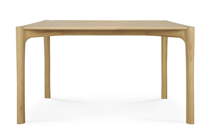PI Dining Table by Ethnicraft, showing front view of pi dining table.