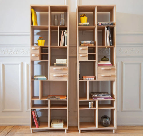 Marius Oak Pirouette Book Rack by Ethnicraft, showing front view of book rack in the live shot.