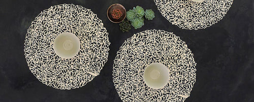 Petal Round Tabletop by Chilewich, showing petal round tabletops in live shot.