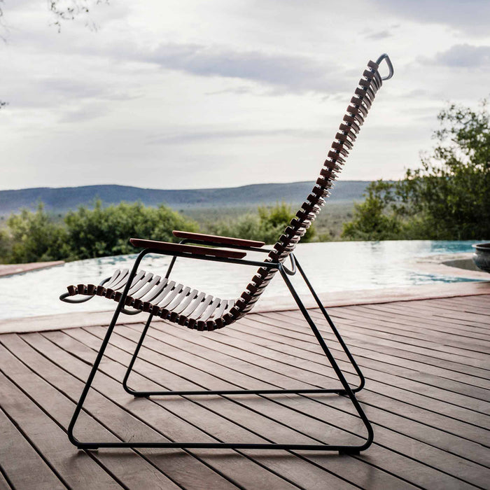 Click Lounge Chair with Bamboo Armrests by Houe, showing click lounge chair with bamboo armrests in live shot.