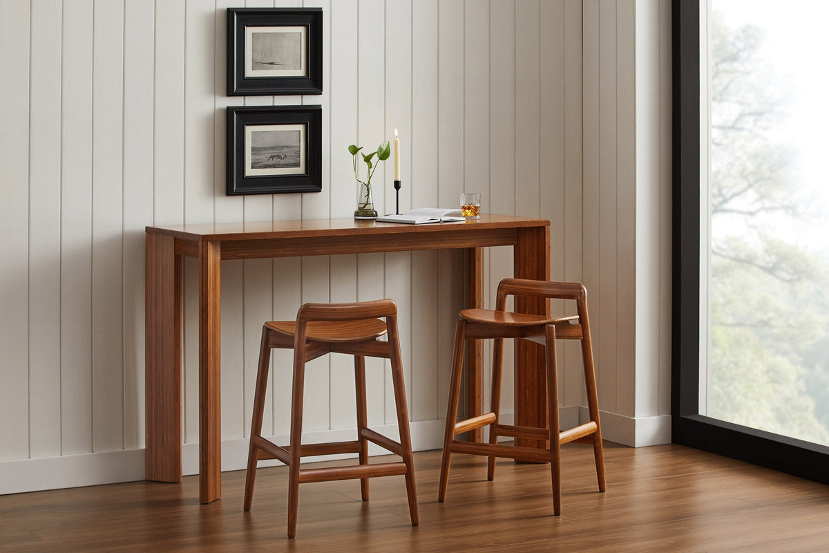 Greenington Linna bamboo counter stools at a wooden counter in a sunlit room