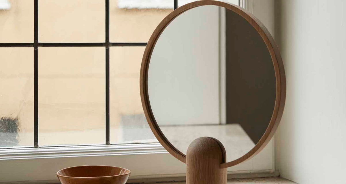 Aino Mirror by Skagerak, showing aino mirror in live shot.