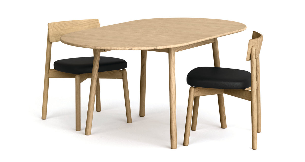 Baton Drop-Leaf Table by Copeland Furniture, showing angle view of baton drop-leaf table with chair. 