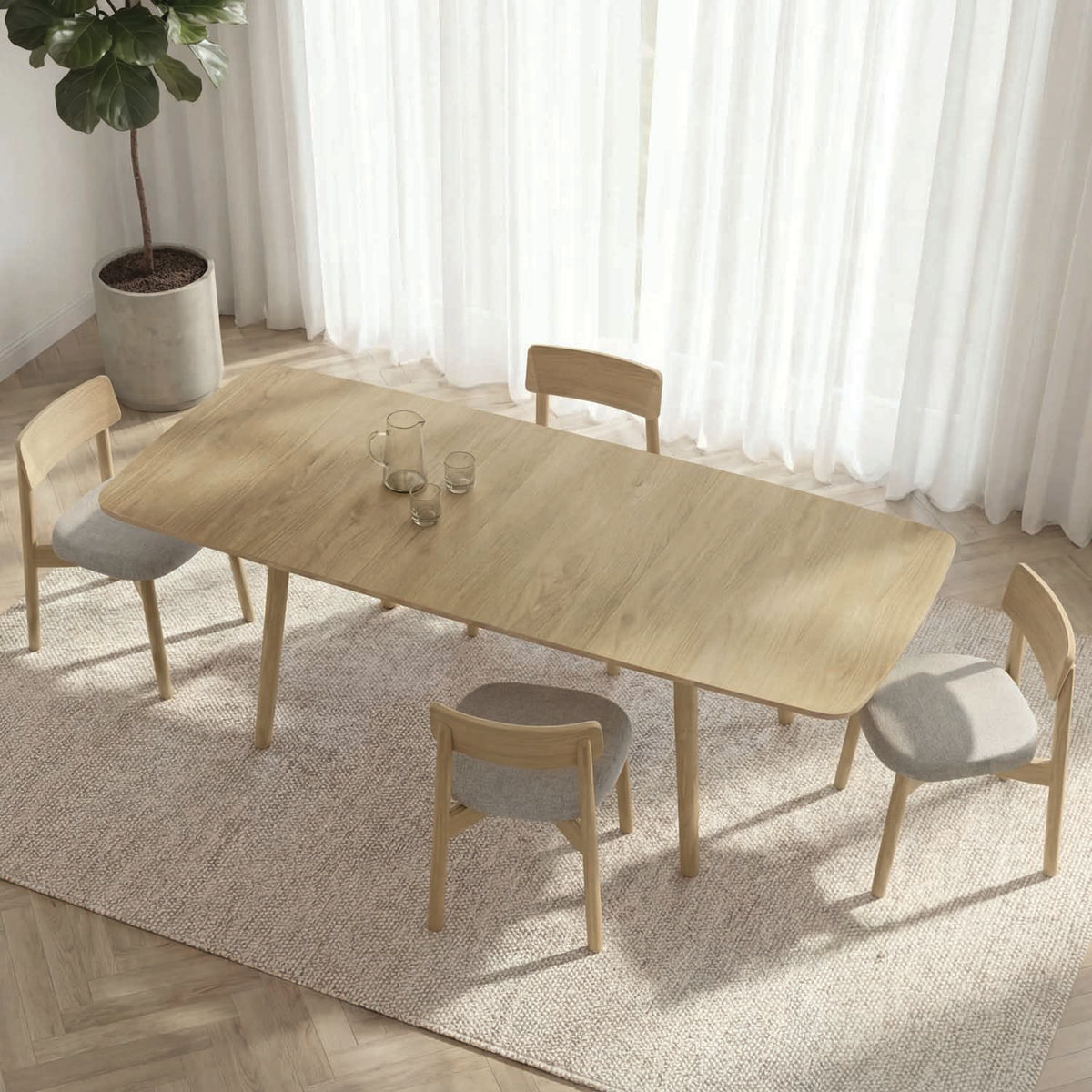Baton Four Leg Extension Table by Copeland Furniture, showing baton four leg extension table in live shot.