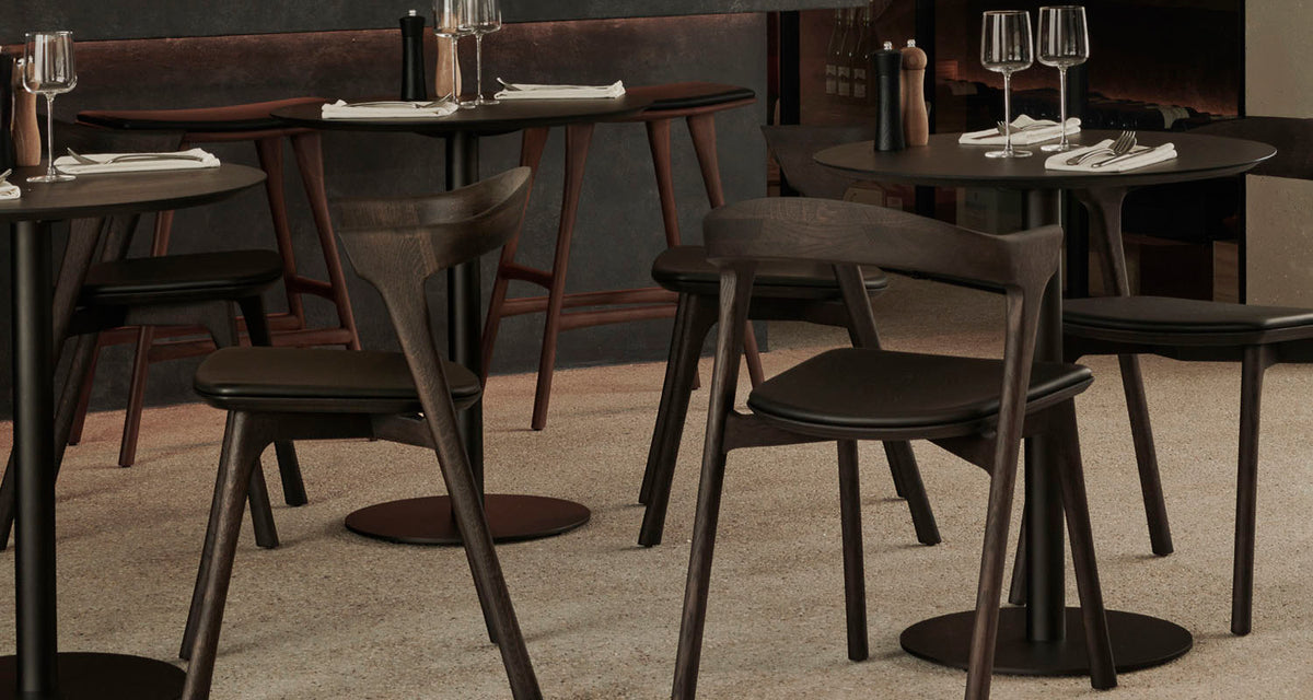 Blend Dining Table by Ethnicraft, showing blend dining tables in live shot.