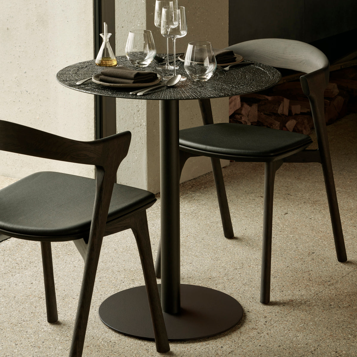 Blend Dining Table by Ethnicraft, showing blend dining table in live shot.