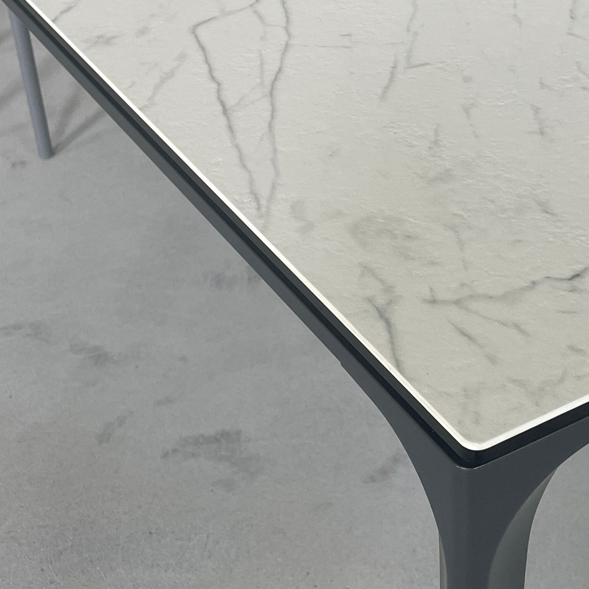 Capri Dining Table by Mobital, showing closeup view of capri dining table.