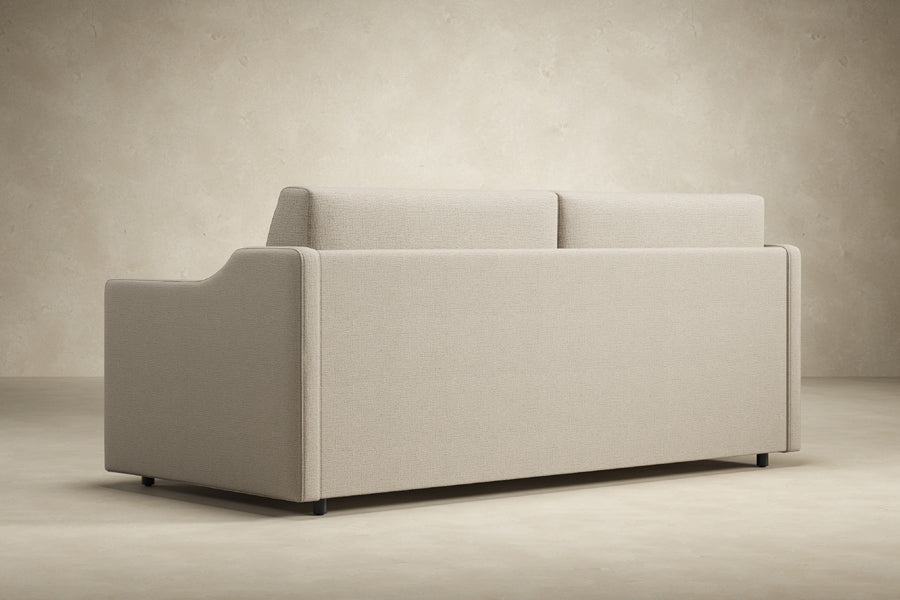 Carnell Sofa Bed With Slope Arms by Innovation, showing back view of carnell sofa bed with slope arms.