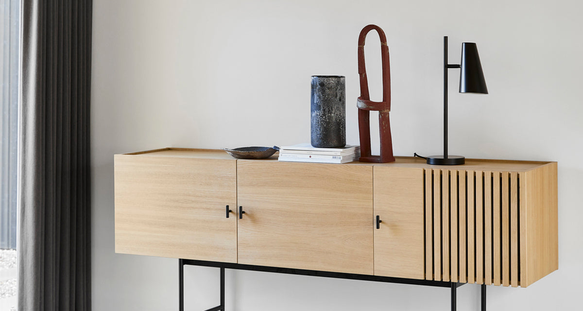 Cono Table Lamp by Woud, showing cono table lamp in live shot.