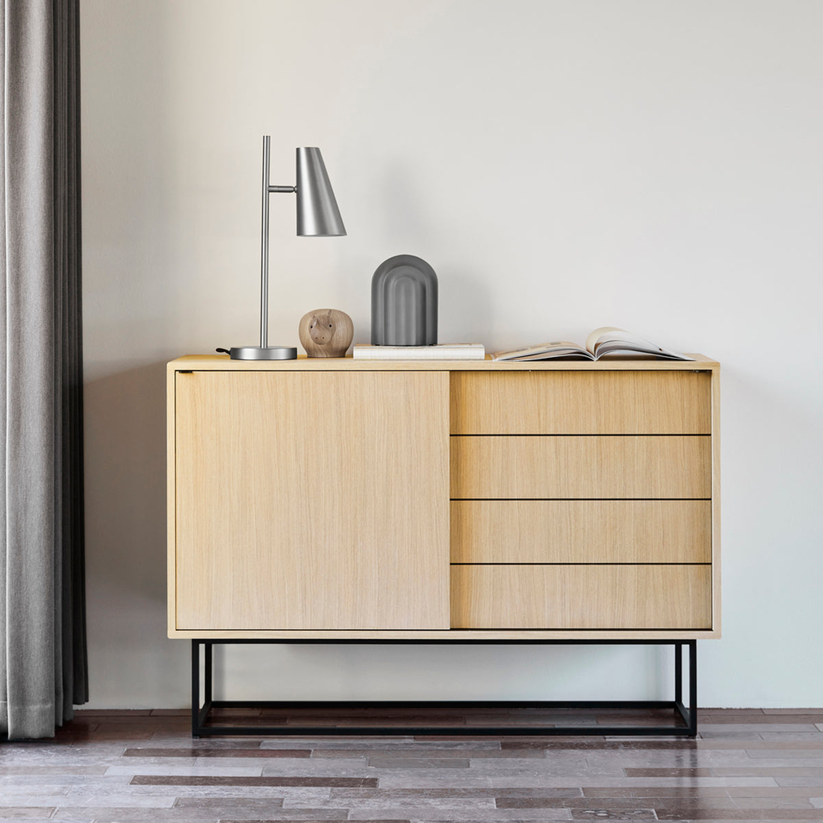 Cono Table Lamp by Woud, showing cono table lamp in live shot.
