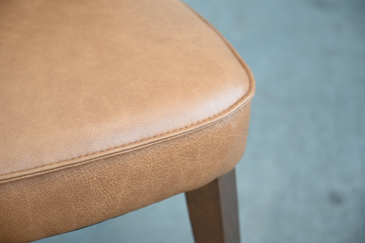 Roulette Dining Chair in Saddle Brown