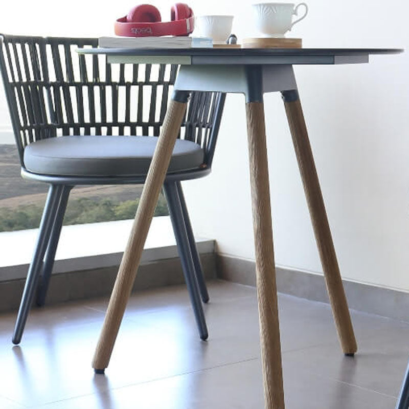 Daisy Balcony Table Teak Legs by Mamagreen, showing daisy balcony table teak legs in live shot.