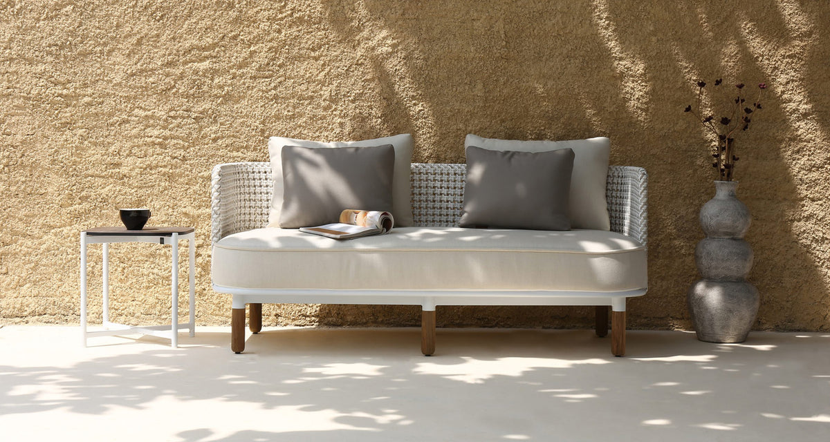 Daisy Mae Chat 2-Seater (Teak Legs) by Mamagreen, showing daisy mae chat 2-seater (teak legs) in live shot.