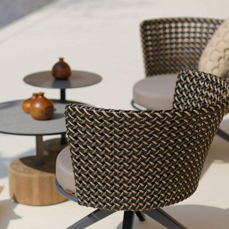 Daisy Mae Swivel Lounge Chair by Mamagreen, showing daisy mae swivel lounge chair in live shot.