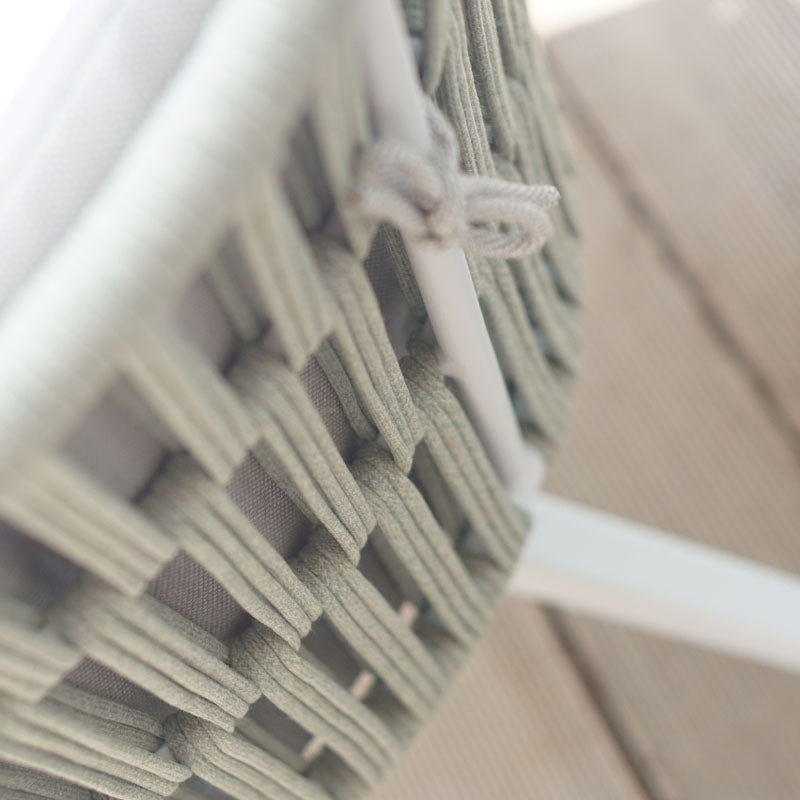 Daisy Rae Dining Chair (Teak Legs) by Mamagreen, showing closeup view of daisy rae dining chair (teak legs) in live shot.