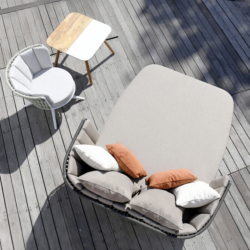 Daisy Rae Daybed (Teak Legs) by Mamagreen, showing daisy rae daybed (teak legs) in live shot.