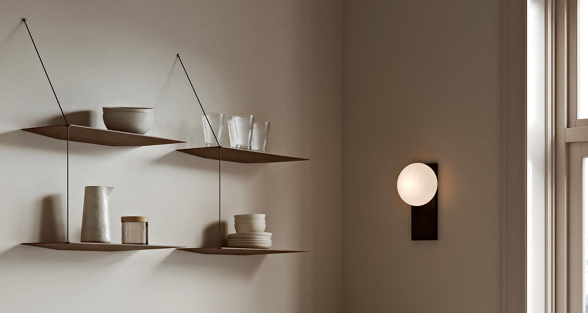 Dew Table/Wall Lamp by Woud, showing dew table/wall lamp in live shot.