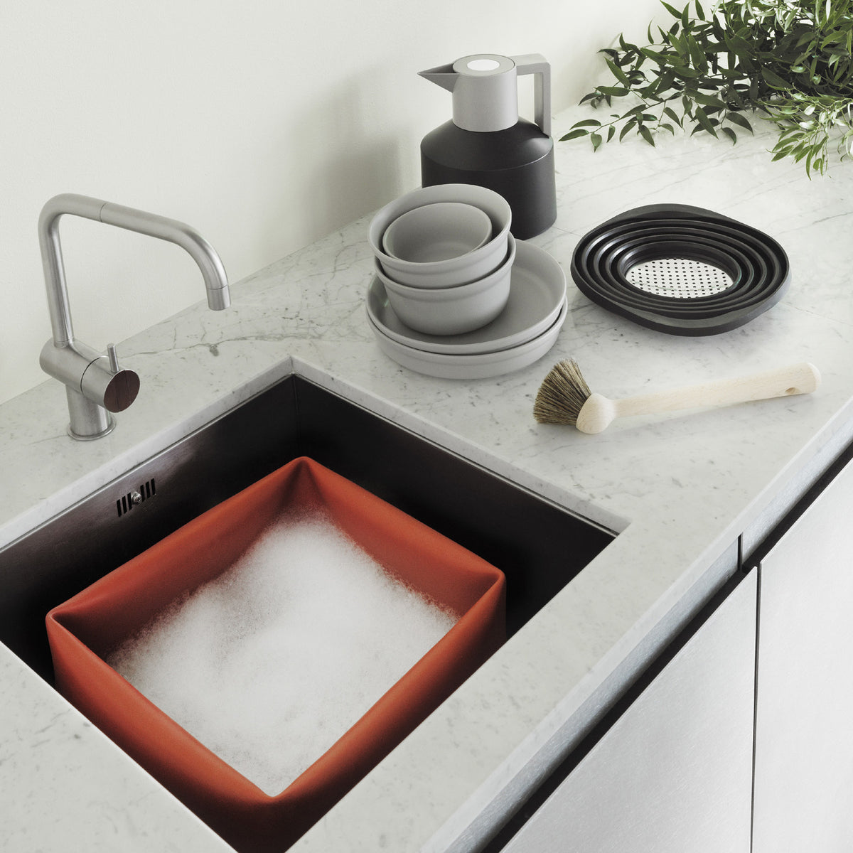 Geo Vacuum Jug by Normann Copenhagen, showing geo vacuum jug in live shot.
