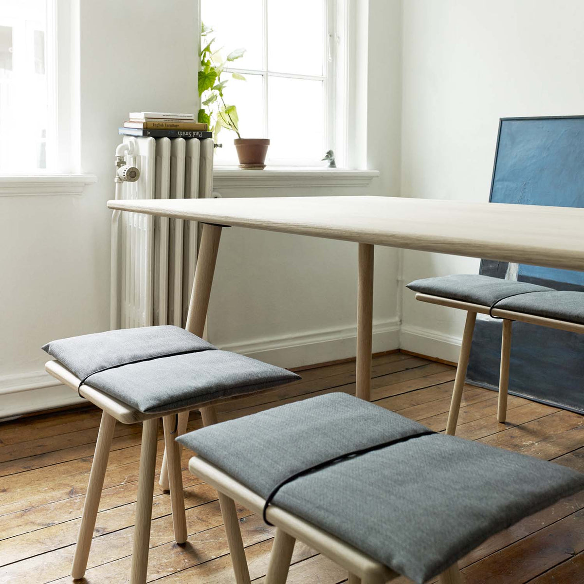 Georg Desk by Fritz Hansen, showing georg desk in live shot.