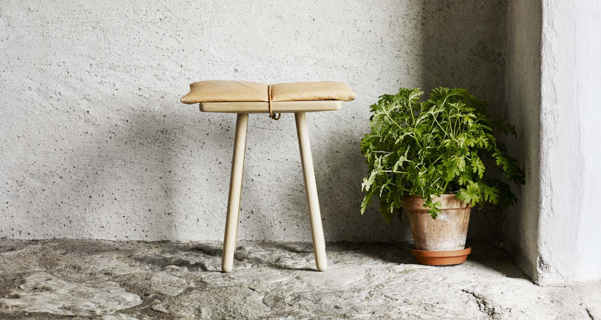 Georg Stool by Skagerak, showing georg stool in live shot.