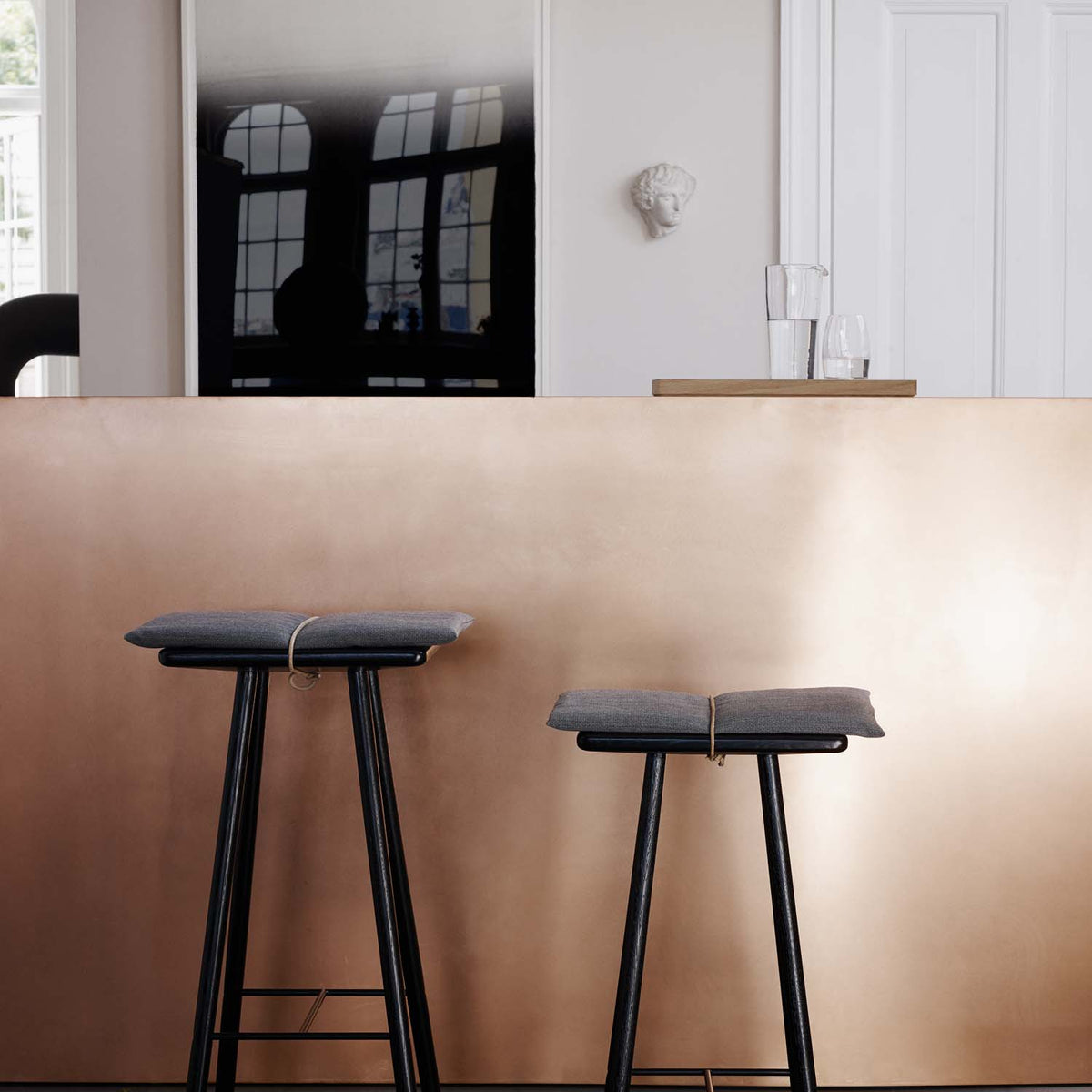 Georg Bar Stool by Skagerak, showing georg bar stool in live shot.