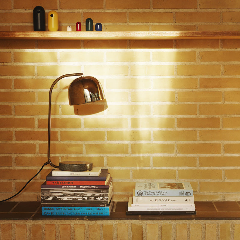 Grant Table Lamp by Normann Copenhagen, showing grant table lamp in live shot.