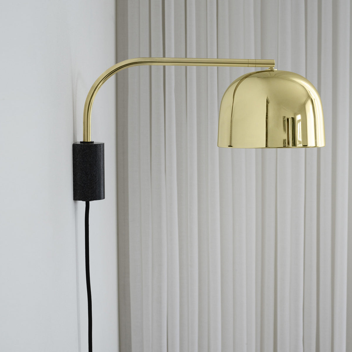 Grant Wall Lamp by Normann Copenhagen, showing grant wall lamp in live shot.