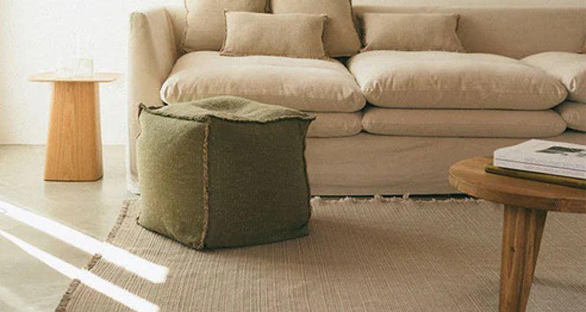 Handloom Pouf by Lorena Canals, showing handloom pouf in live shot.