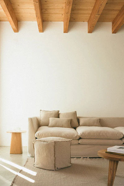 Handloom Pouf by Lorena Canals, showing handloom pouf in live shot.