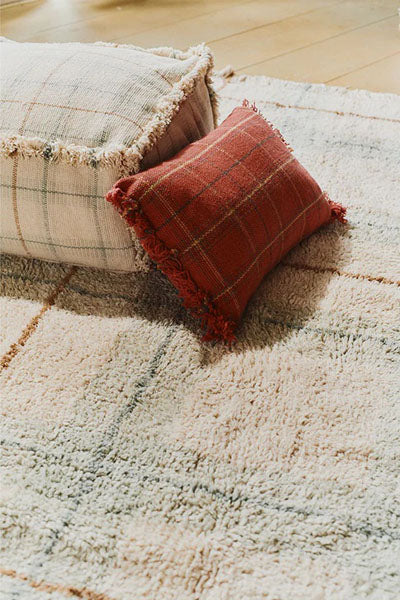 Wouf Handloom Cushion by Lorena Canals, showing wouf handloom cushion in live shot.