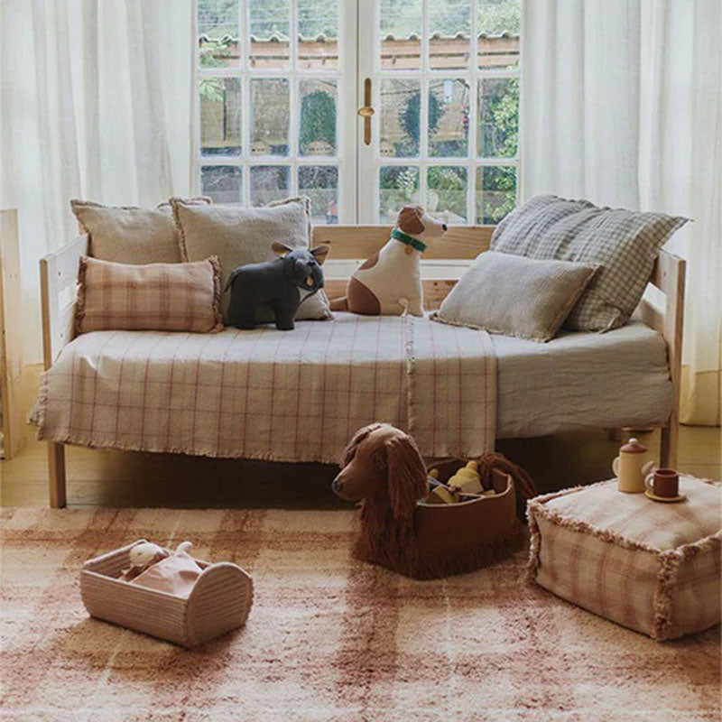 Wouf Handloom Cushion by Lorena Canals, showing wouf handloom cushion in live shot.
