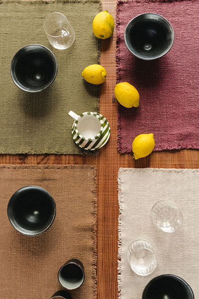 Handloom Placemats (Set of 4)  by Lorena Canals, showing handloom placemats in live shot.