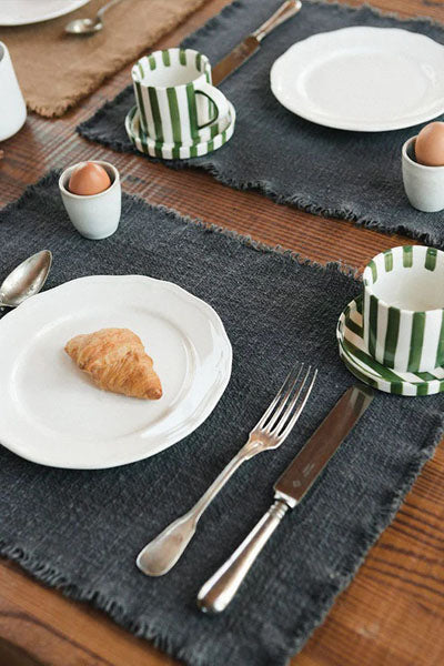 Handloom Placemats (Set of 4)  by Lorena Canals, showing handloom placemats in live shot.