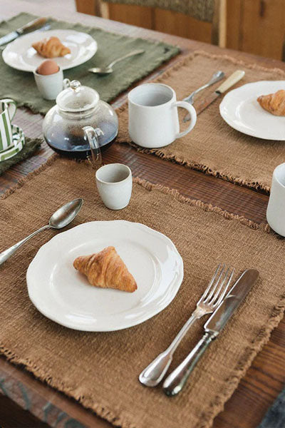 Handloom Placemats (Set of 4)  by Lorena Canals, showing handloom placemats in live shot.
