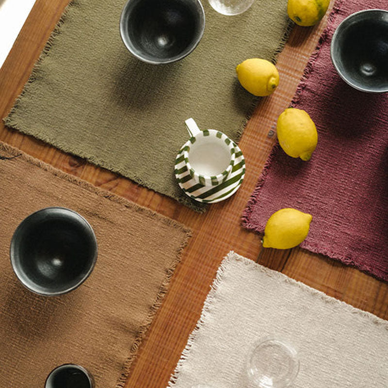 Handloom Placemats (Set of 4)  by Lorena Canals, showing handloom placemats in live shot.