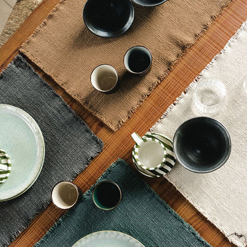 Handloom Placemats (Set of 4)  by Lorena Canals, showing handloom placemats in live shot.