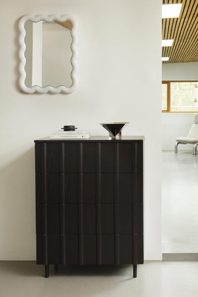 Illu Mirror by Normann Copenhagen, showing illu mirror in live shot.