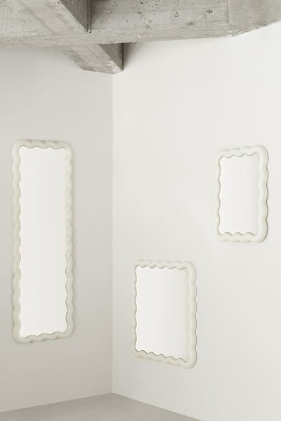 Illu Mirror by Normann Copenhagen, showing illu mirror in live shot.