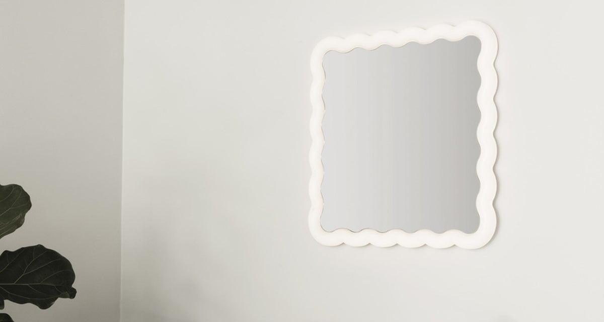 Illu Mirror by Normann Copenhagen, showing illu mirror in live shot.