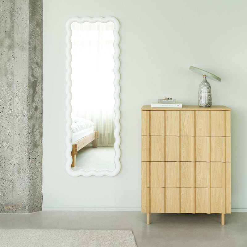 Illu Mirror by Normann Copenhagen, showing illu mirror in live shot.