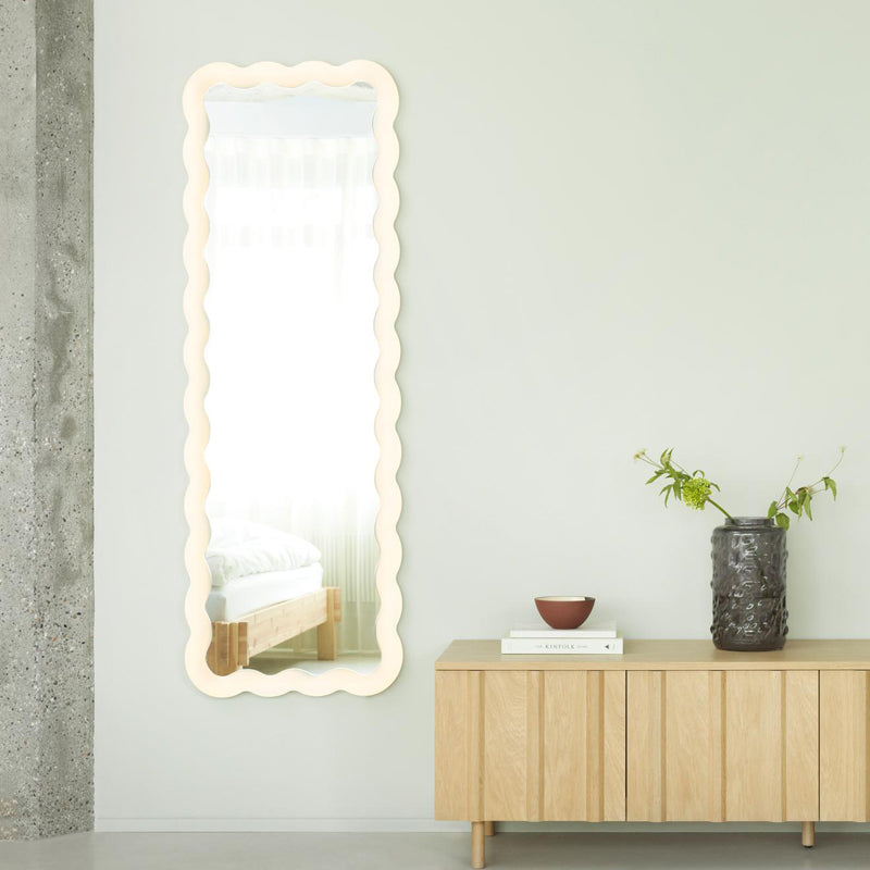 Illu Mirror by Normann Copenhagen, showing illu mirror in live shot.