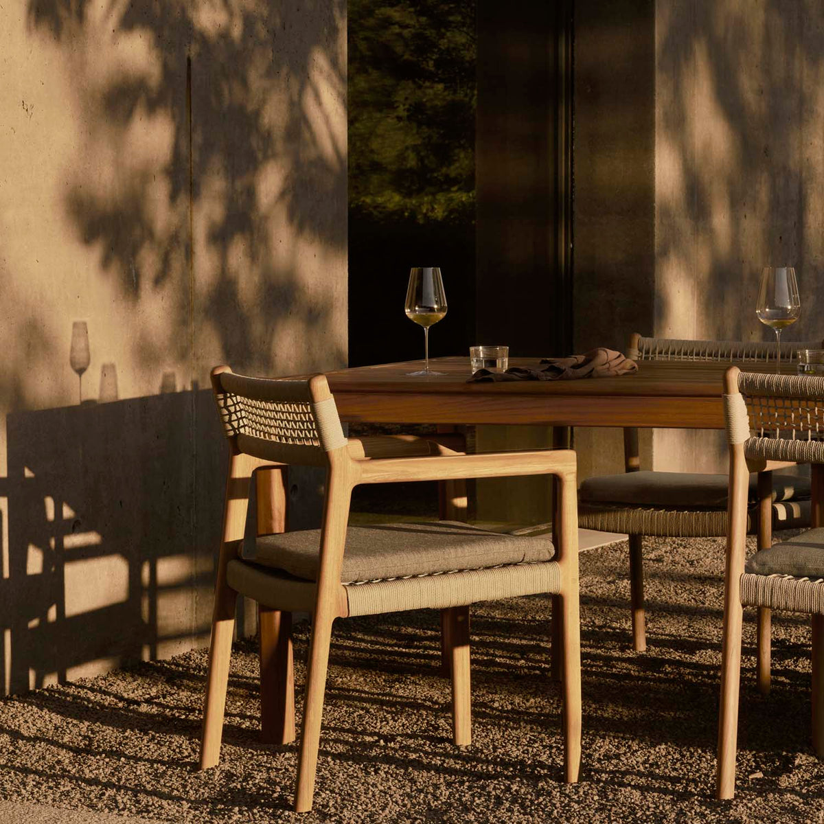 Jack Woven Outdoor Dining Chair by Ethnicraft, showing jack woven outdoor dining chair in live shot.