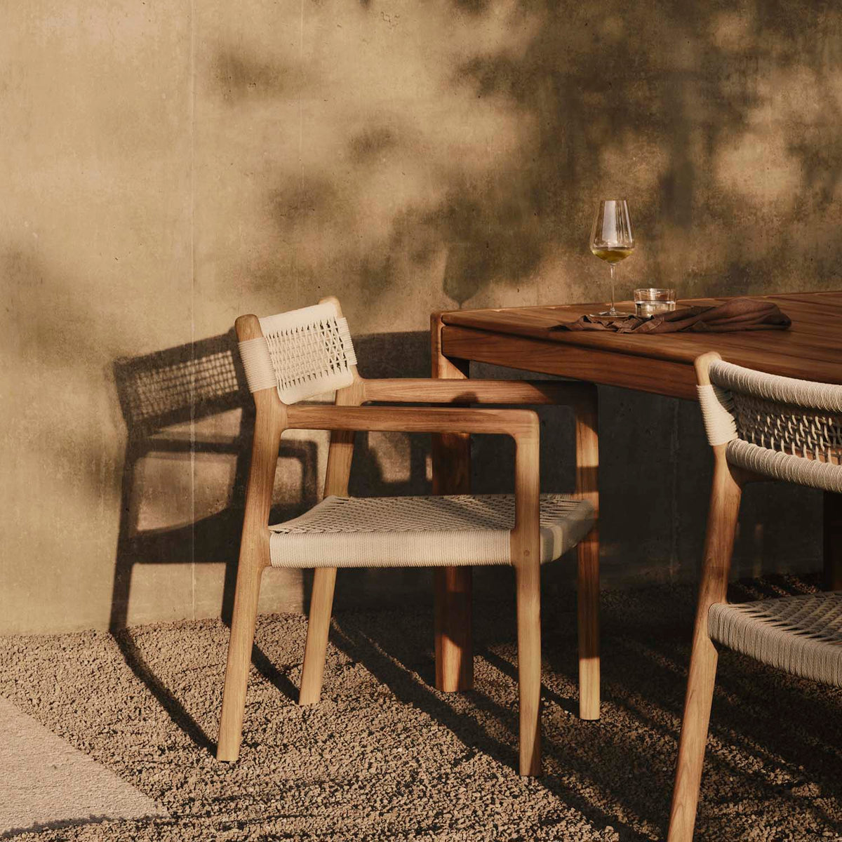 Jack Woven Outdoor Dining Chair by Ethnicraft, showing jack woven outdoor dining chair in live shot.