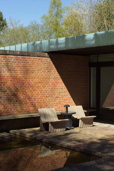 Limit Outdoor Lounge Chair by Normann Copenhagen, showing limit outdoor lounge chair in live shot.