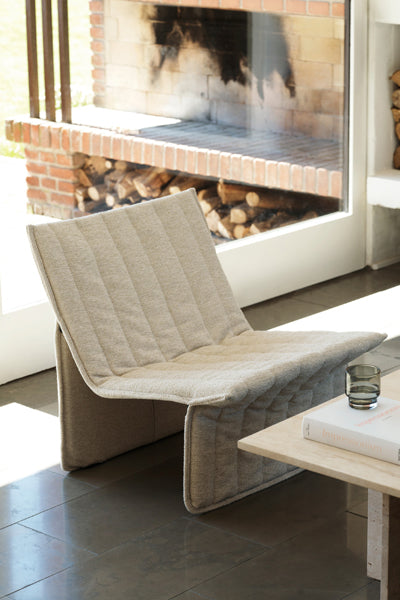 Limit Lounge Chair by Normann Copenhagen, showing limit lounge chair in live shot.