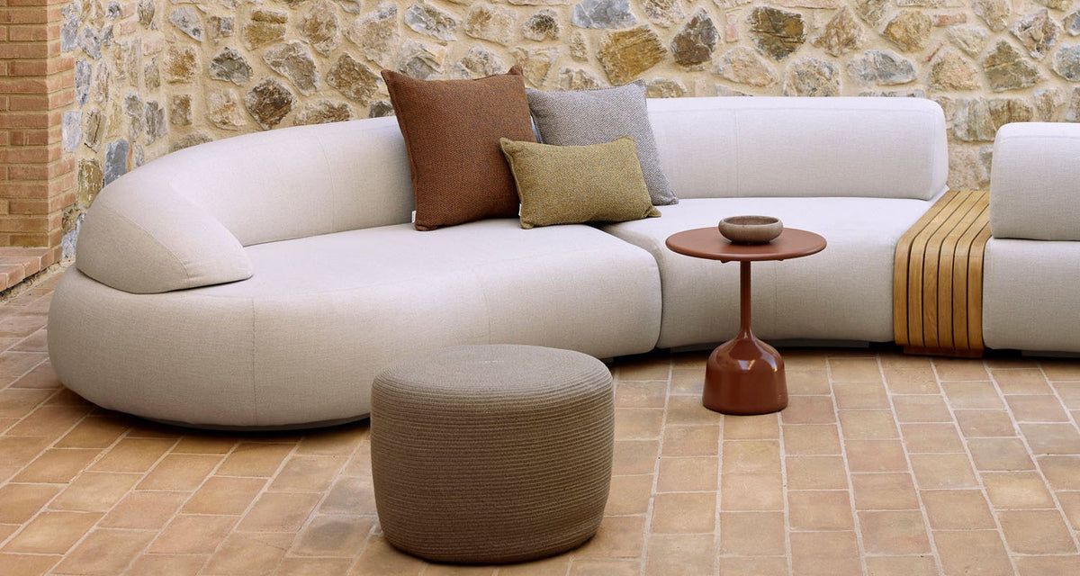Mellow Sectional Sofa by Cane-Line, showing mellow sectional sofa in live shot.