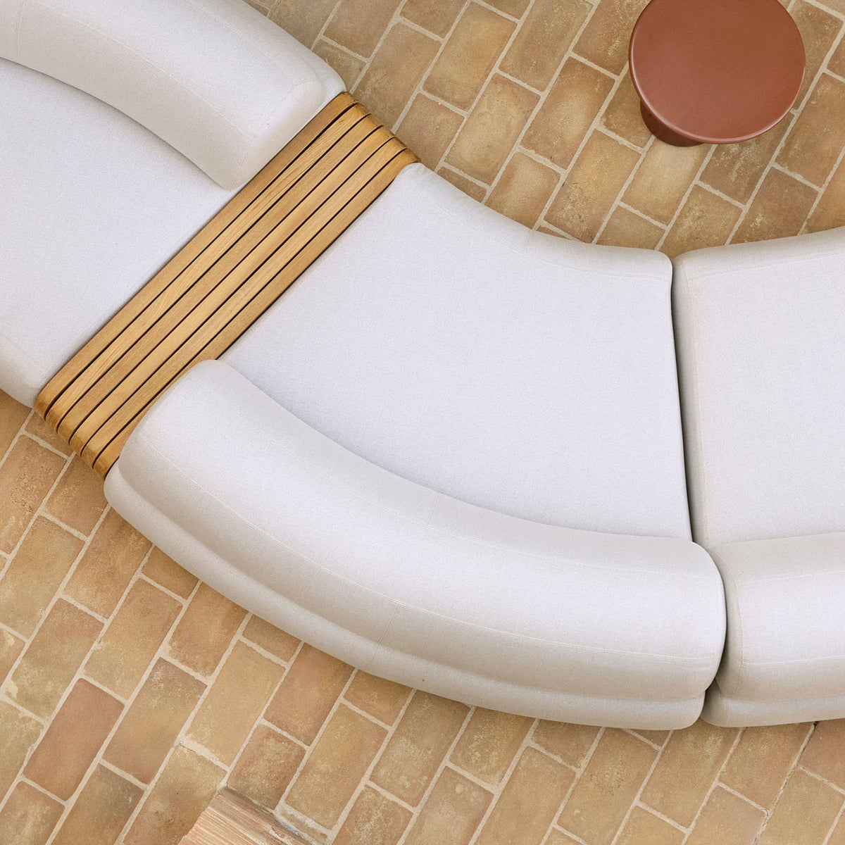 Mellow Sectional Sofa by Cane-Line, showing mellow sectional sofa in live shot.
