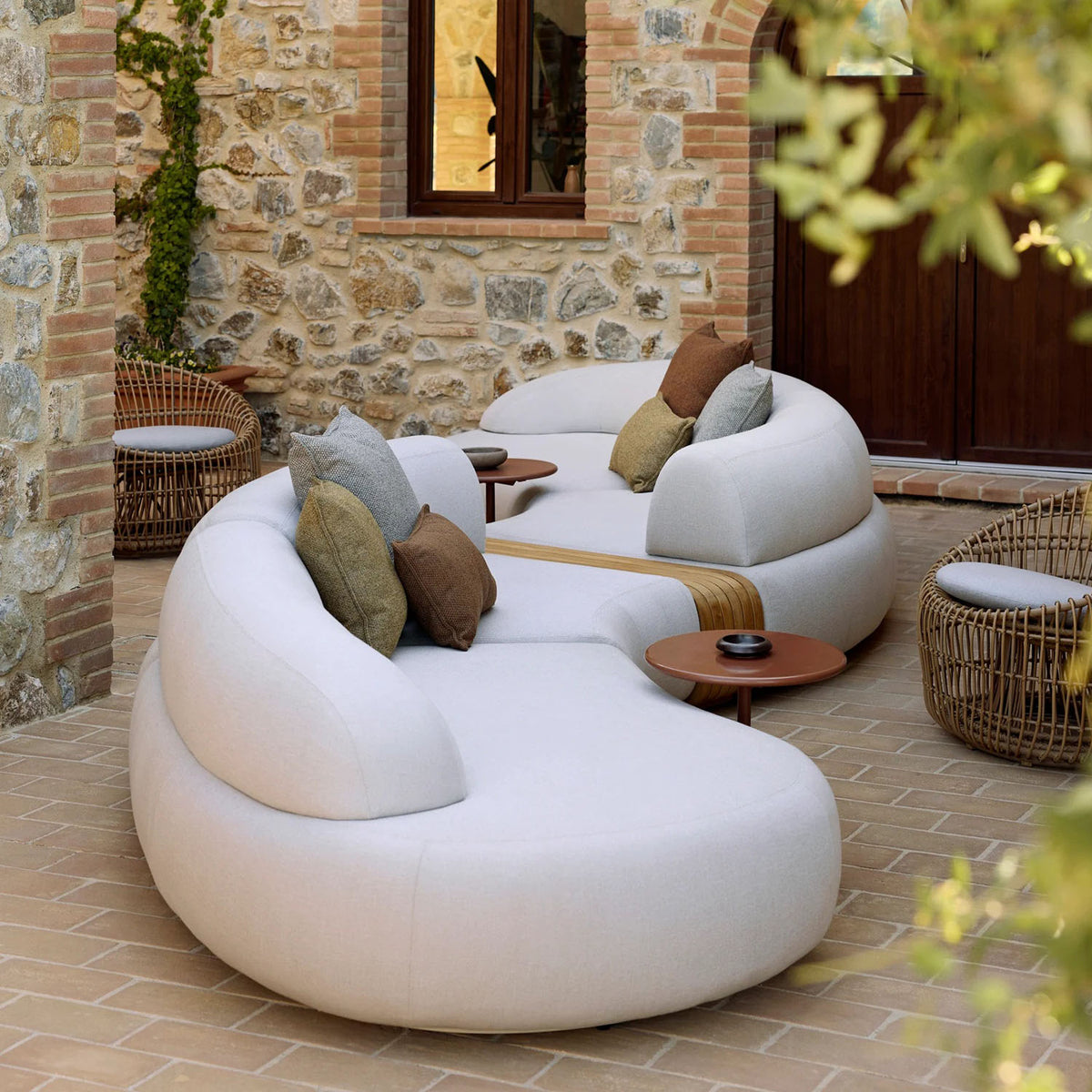 Mellow Sectional Sofa by Cane-Line, showing mellow sectional sofa in live shot.