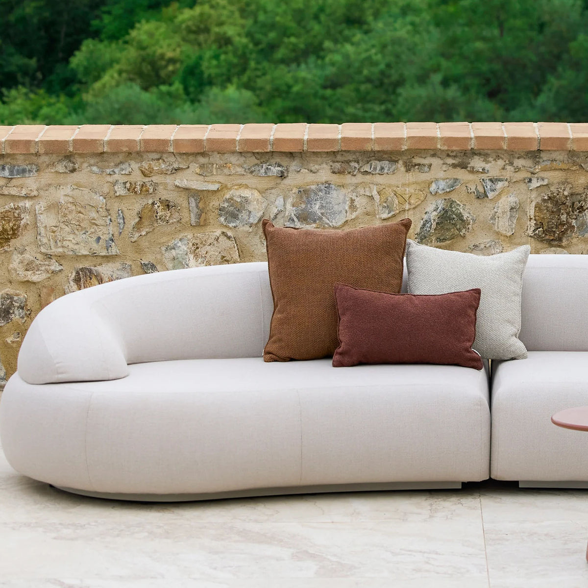 Mellow Configuration by Cane-Line, showing mellow configuration sofa in live shot.