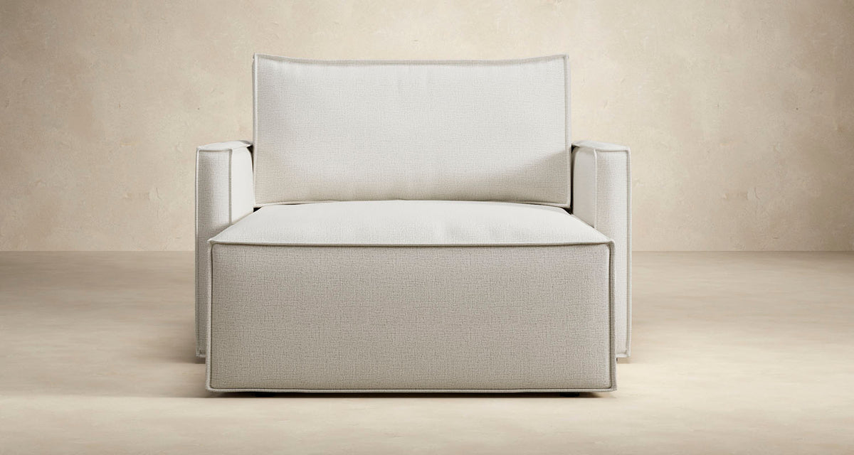 Newilla Lounger Chair with Slim Arms by Innovation, showing front view of newilla lounger chair with slim arms.